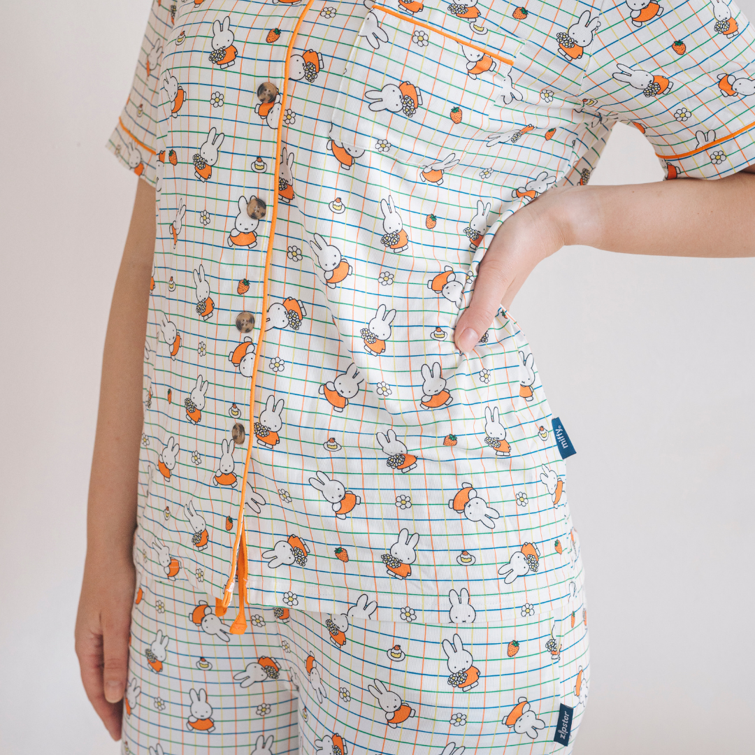 Woman wearing the Ladies Miffy Checkered Bloom bamboo pyjama set